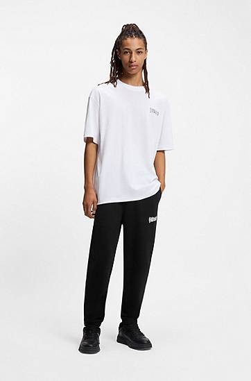 Træningsdragt BOSS Cotton-terry tracksuit bottoms with logo print Sort | 50549779, 1