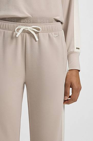 Træningsdragt BOSS Contrast-trim tracksuit bottoms with double waistband Beige | 50550717, 1
