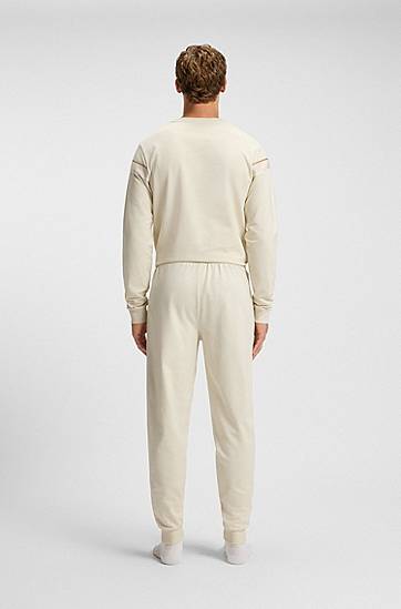 Joggingbukser BOSS Cotton-terry tracksuit bottoms with side tape and vertical logo Beige | 50550613, 1