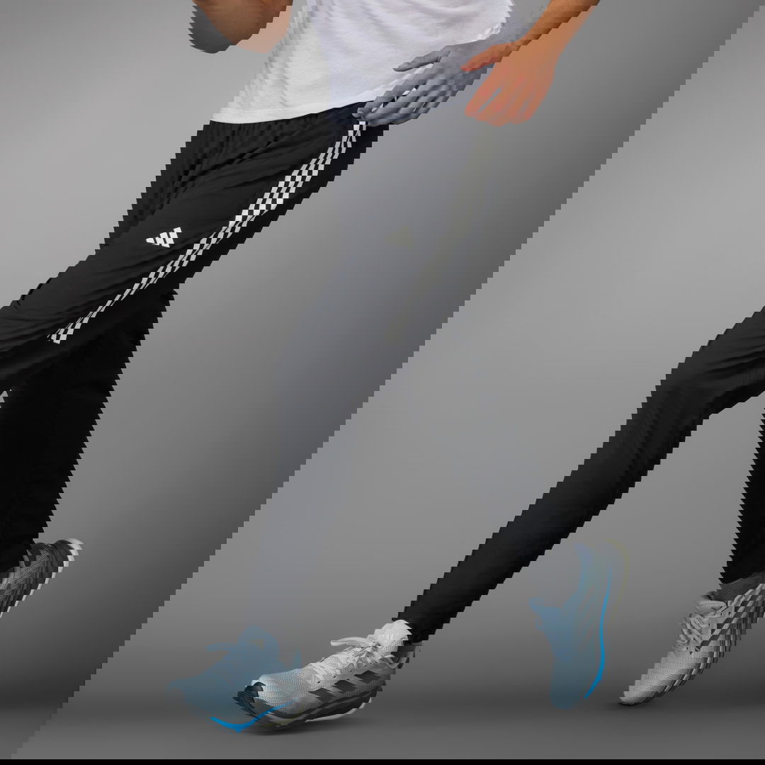 Joggingbukser adidas Performance Own the Run 3-Stripes Pants Sort | IK4982, 1