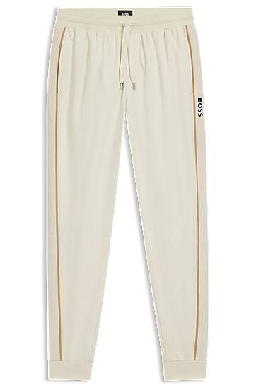 Joggingbukser BOSS Cotton-terry tracksuit bottoms with side tape and vertical logo Beige | 50550613