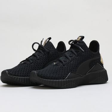 Sneakers og sko Puma Defy Varsity Wn's black - metallic gold Sort | 191148 01, 0