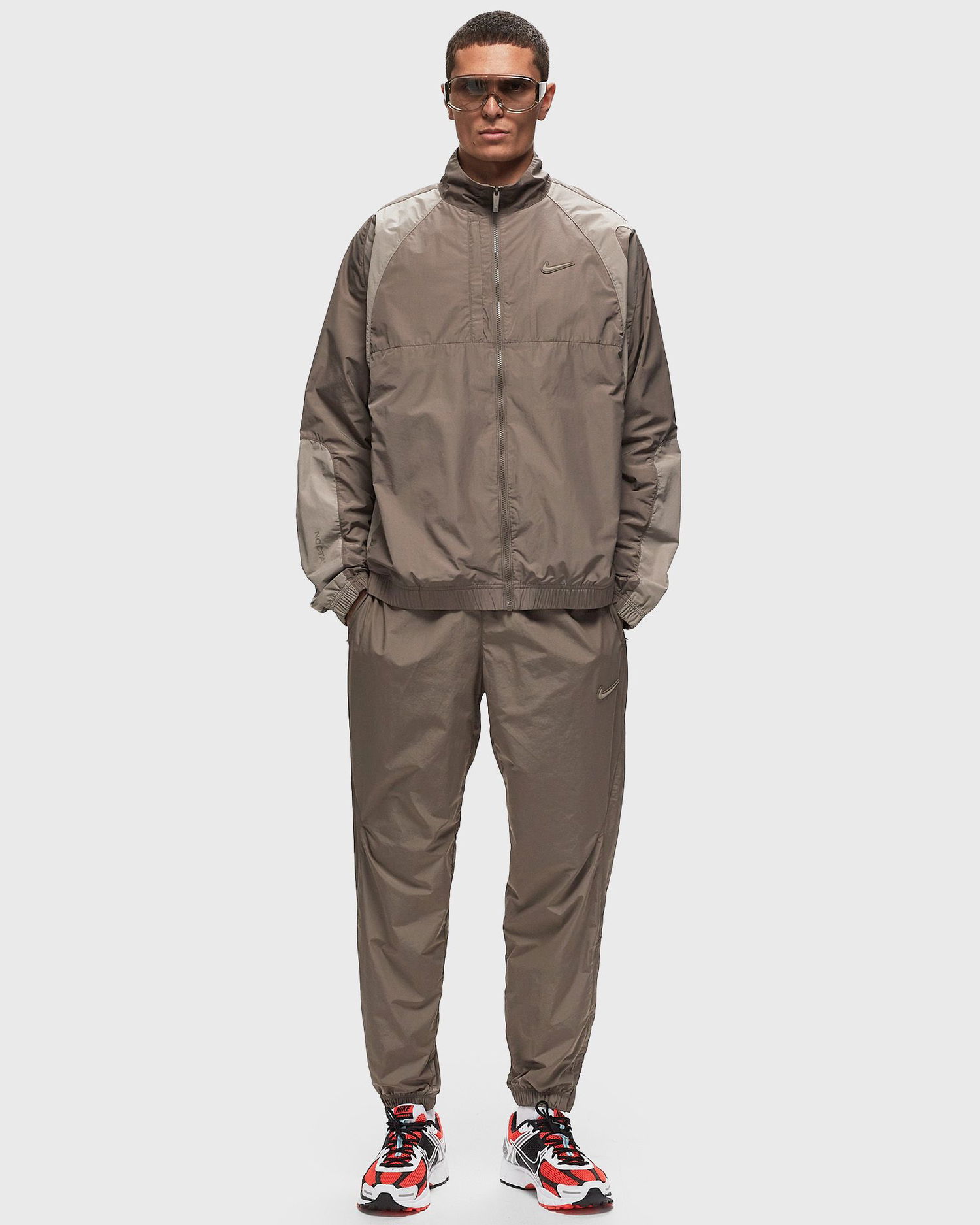Joggingbukser Nike NOCTA x NORTHSTAR NYLON TRACKSUIT BOTTOMS Brun | FN7668-040, 1