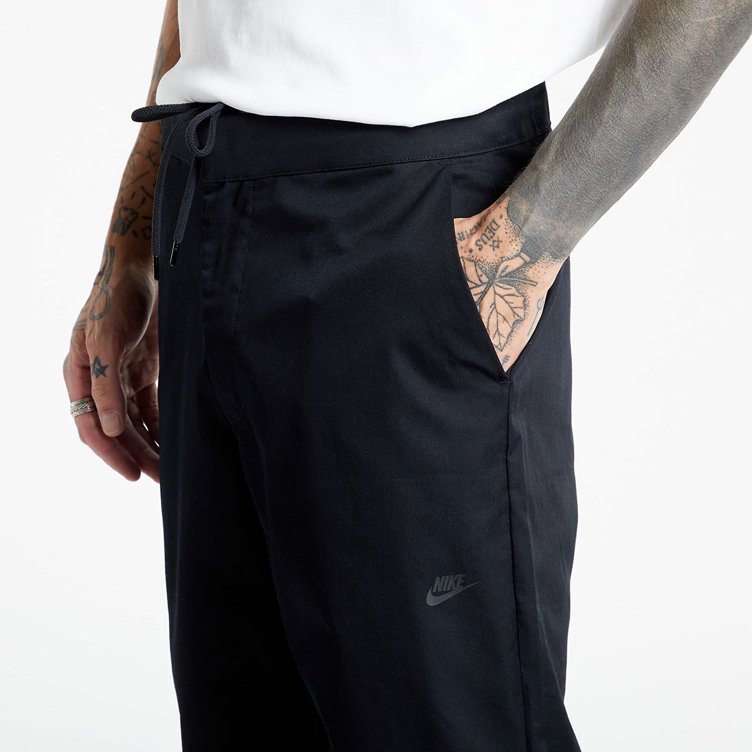 Joggingbukser Nike Sportswear Style Essentials Woven Unlined Sneaker Pants Sort | DD7032-010, 1