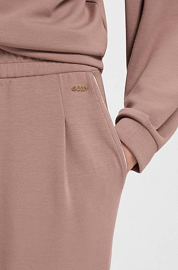 Bukser BOSS Tapered Tracksuit Bottoms with Gloss Piping Lyserød | 50545648, 1