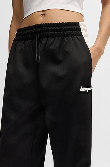 Joggingbukser BOSS Retro Tracksuit Bottoms with Side Stripe Sort | 50537080, 1