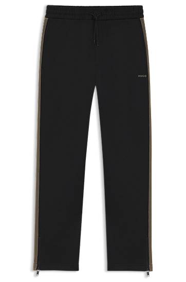 Joggingbukser BOSS Relaxed-fit tracksuit bottoms with logo tape and ankle zippers Sort | 50551351