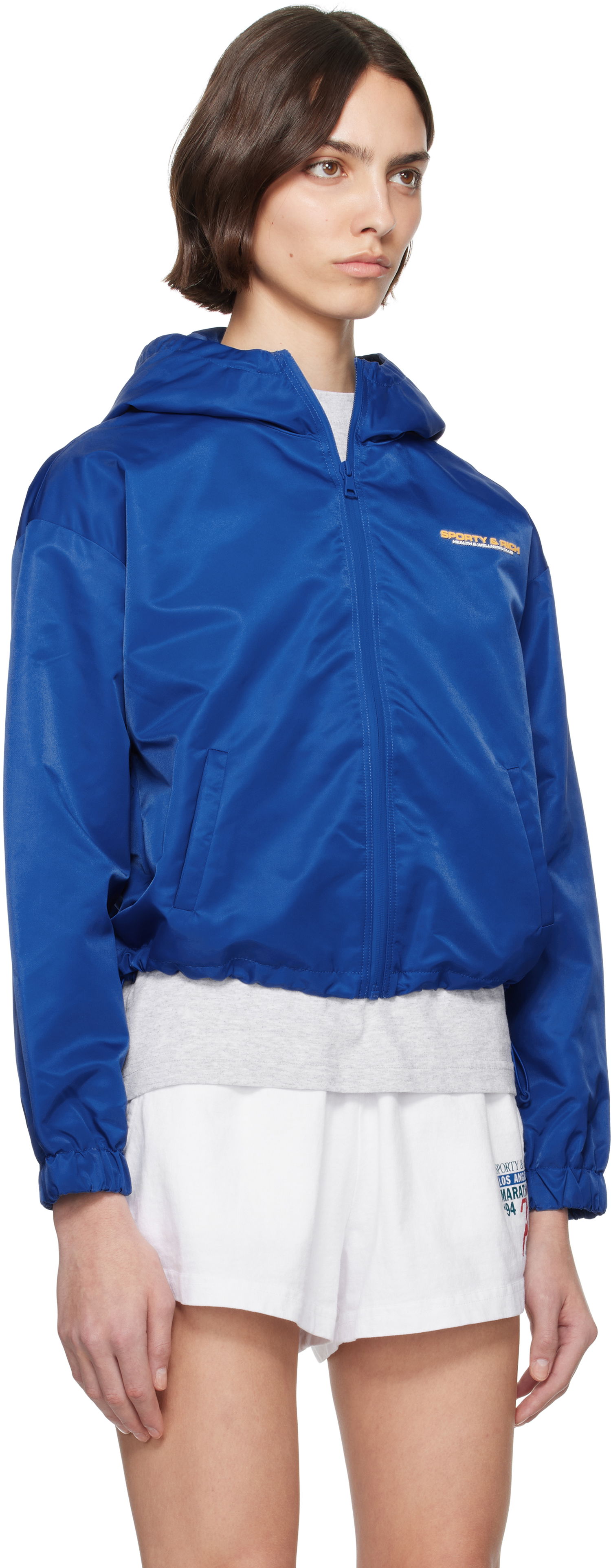 Vindjakke Sporty & Rich Sporty & Rich Bold Health Nylon Windbreaker Jacket Blå | JA017622324BL67, 1