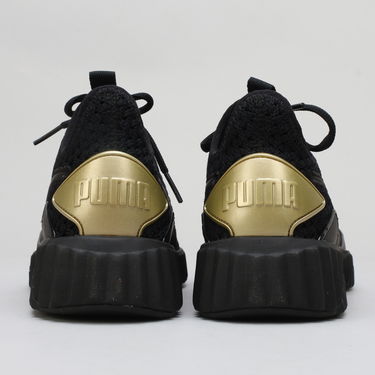 Sneakers og sko Puma Defy Varsity Wn's black - metallic gold Sort | 191148 01, 3